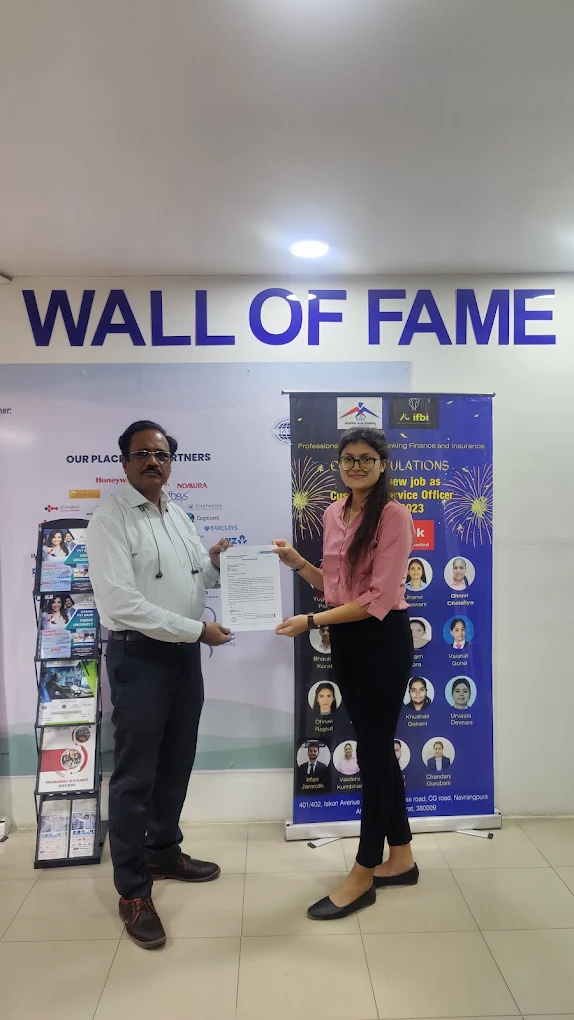 Pro IFBI student receiving offer letter as Customer Service Officer at the Wall of Fame
